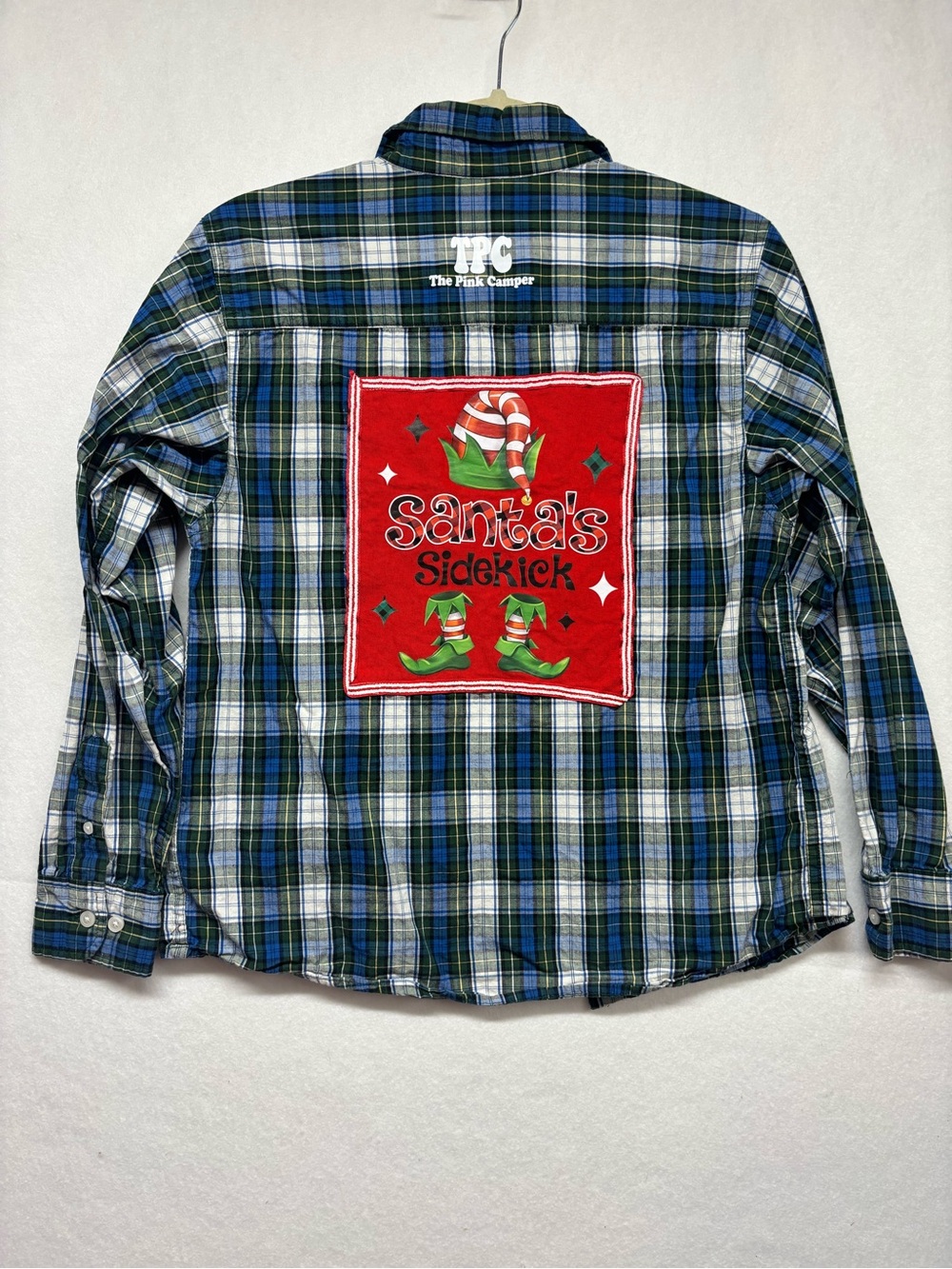 Santa’s Sidekick Button Up Upcycled tee patch.